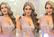 முன்னழகை எடுப்பா காட்டி உச்சகட்ட கவர்ச்சி போஸ் கொடுத்த நிதி அகர்வால்!!